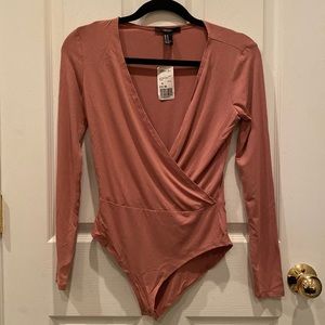 Forever 21 Bodysuit. Never been worn, tag still on